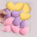 Kit with 12 multicolored makeup sponges.